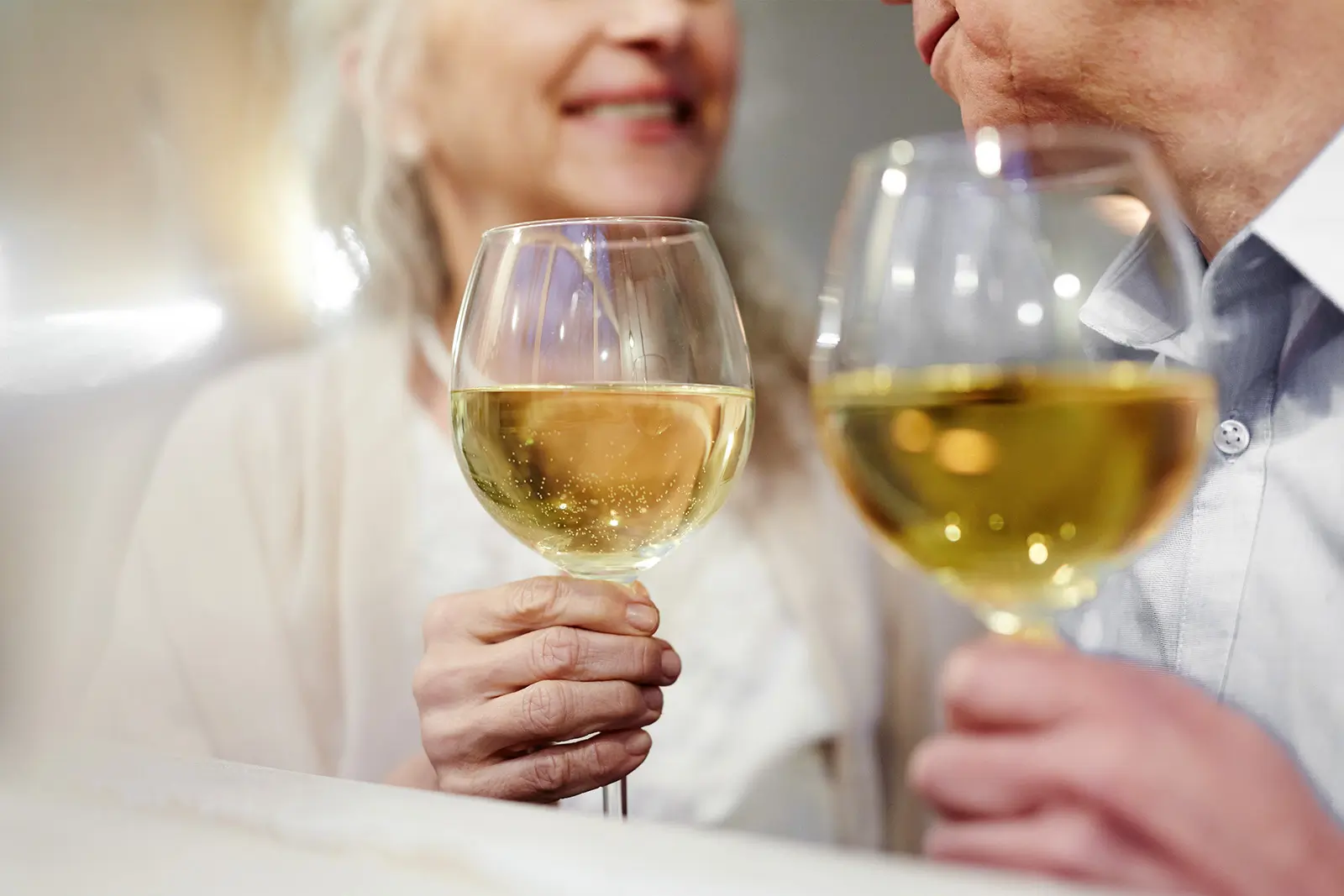a couple drinking wine for anniversaries, weddings and special occasions