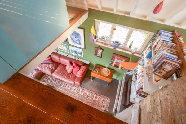 looking down from the top floor into The living room at The Garden House in Norton St Philip near Bath